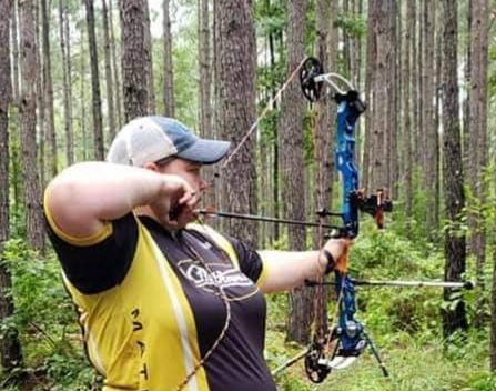 Lainey Smith shooting her bow