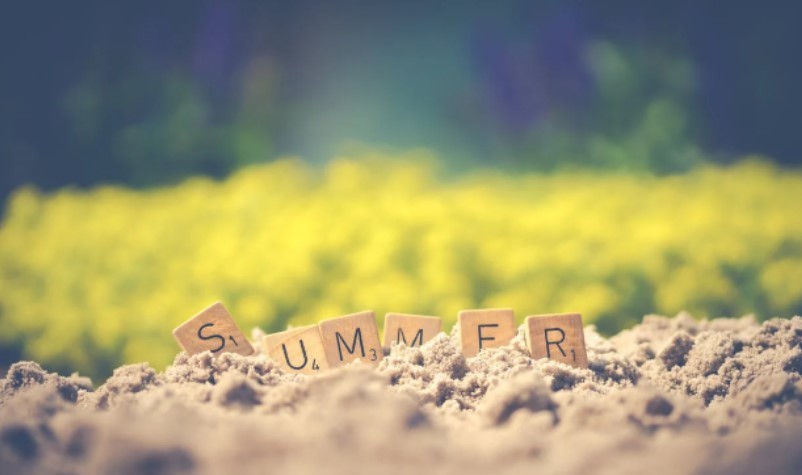 summer written in sand